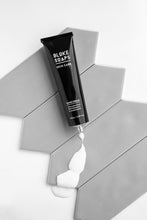 Load image into Gallery viewer, Cedarwood, Peppermint & Bergamot hand cream on grey tiles