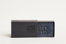 Load image into Gallery viewer, Bloke Soaps Hand On peppermint (Charcoal) soap in black cardboard packaging.
