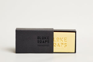 Bloke Soaps trendsetter (yellow) soap in black cardboard packaging.